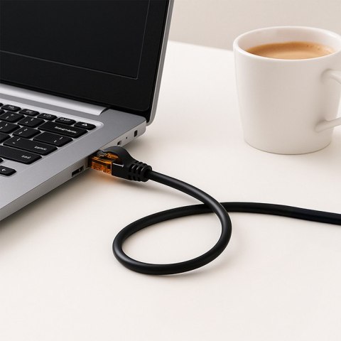 Qoltec Kabel Patchcord UTP | CAT6 | 2 x RJ-45 | High speed 1Gb/s | Pozłacane styki | 10m | czarny