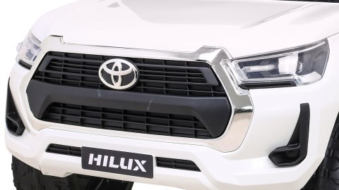 Toyota Hilux na akumulator dla dzieci Biały Pickup + Napęd 4x4 + Pilot + 2 bagażniki