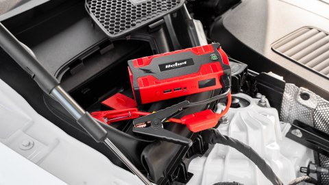Jump starter - power bank z przewodami rozruchowymi i kompresorem